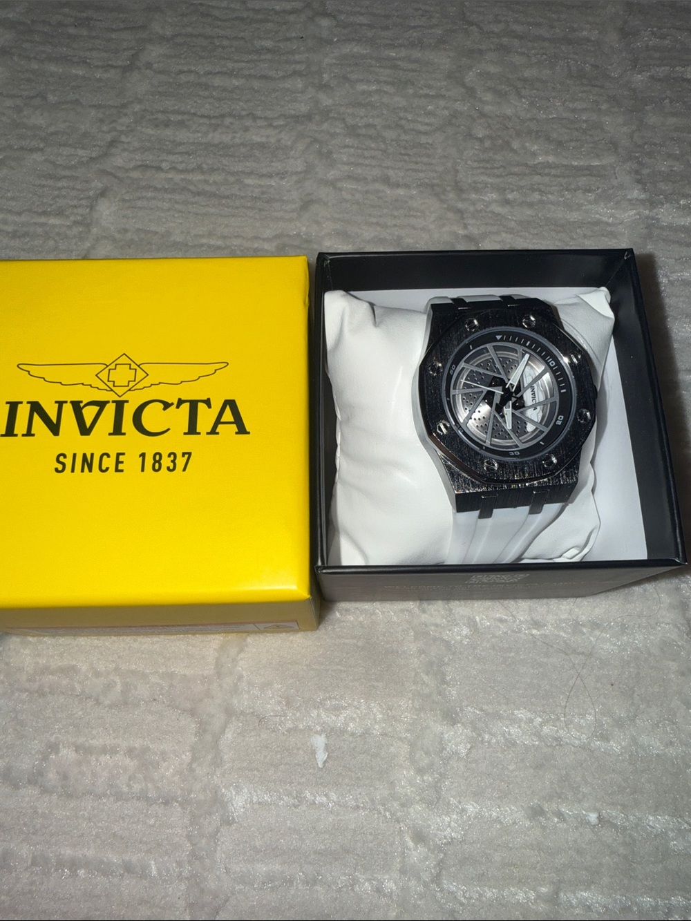 Invicta White and Silver Skeleton Dial Watch